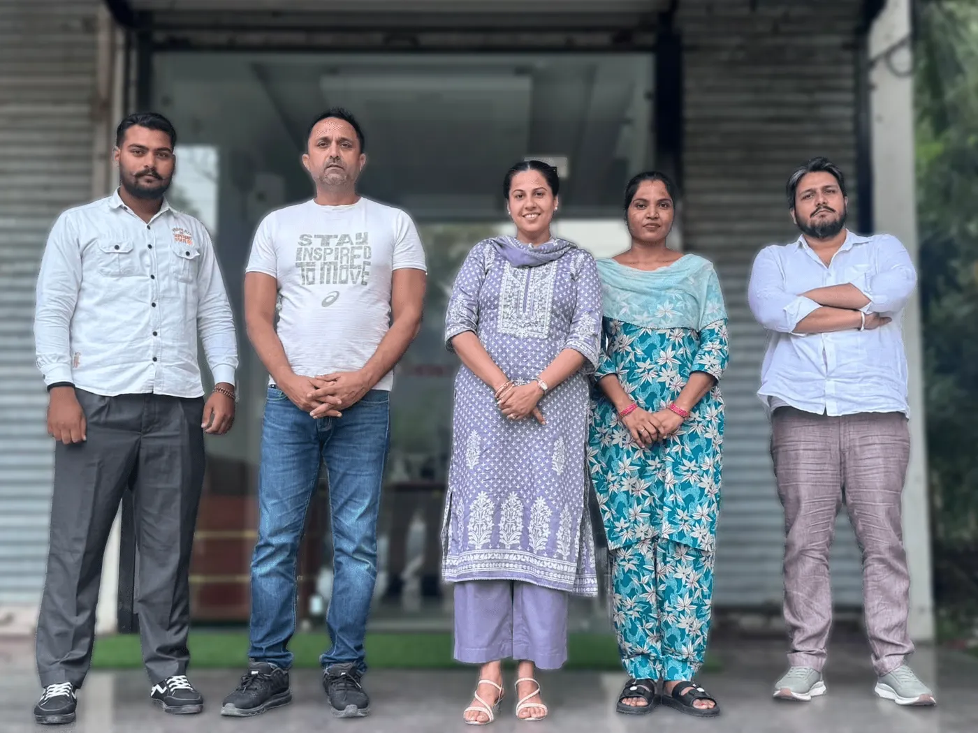 Five members of the Lifeset Overseas team standing outside the office on Nabha Road, Patiala